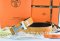 Hermes Reversible Belt Orange/Black Crocodile Stripe Leather With18K Silver Geometric Stripe H Buckle